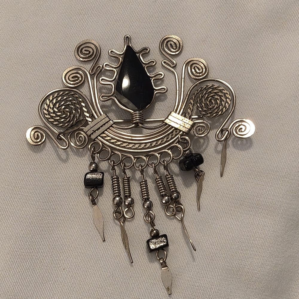 Elegant Black and Silver Brooch